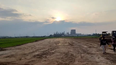 Landscape 4K Sunset Over Rice Fields and Factories Video stock 280257443