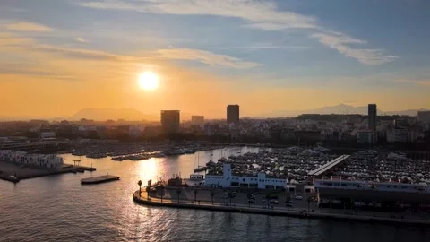 Landscape Aerial view looking upwards of sunset y Skyline of Alicante and Port Stock Footage 344054791