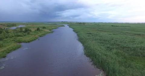 Landscape Aerial view of the river in front of a thunderstorm. 動画素材 86825534