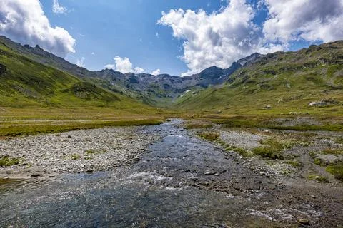 Landscape of an alpine river on Splugen Pass Stock Photos