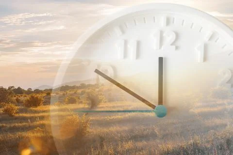 Landscape and close up of clock. Double exposure. Daylight Savings Time Conce 스톡 사진