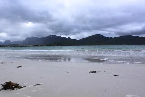 Landscape with a beach against the backdrop of mountains - Lofoten, Ramberg Stock Photos