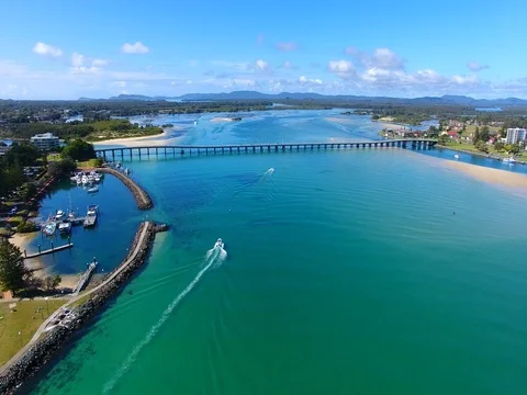 Landscape of a beautiful long bridge, clear water with boats 스톡 동영상 84077338