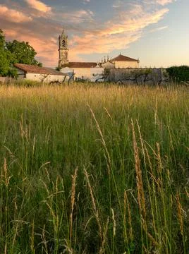 Landscape with bell tower Stock Photos