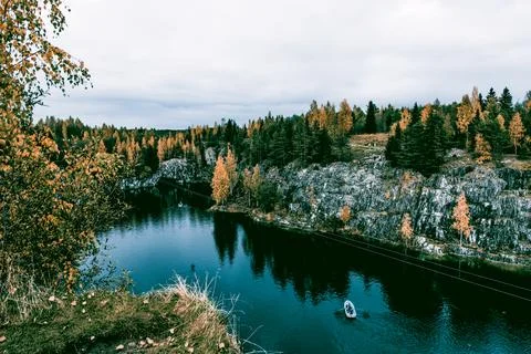 Landscape of blue deep lake light daytime, clouds sky, Ruskeala Karelia Russi Foto stock