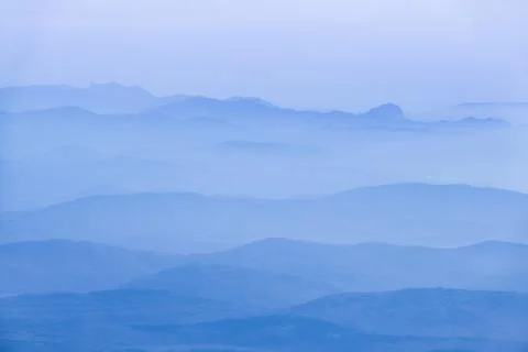 Landscape with blue mountains Stock Photos