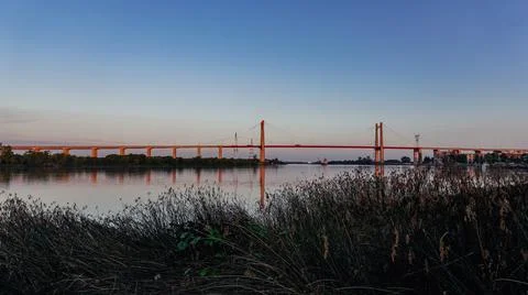 A landscape of a Bridge reflected in the river Stock Photos