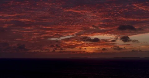 Landscape bright red clouds of sunrise over Bermuda Hamilton Video stock 108936886