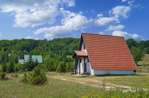 Landscape with a camping house on the background of the forest for tourists Stock Photos