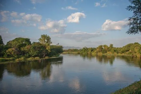 The landscape of Clean river view surrounded by green trees Stock Photos