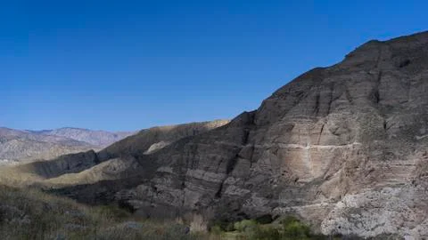 Landscape of cloud shadows on mountain range Foto stock