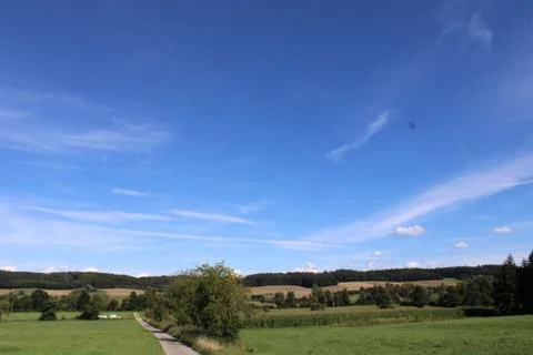 Landscape with clouds above. Stock Photos
