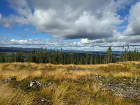 Landscape with clouds and mountains Stock Photos