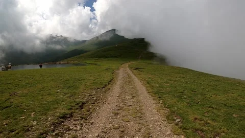 Landscape with clouds (hiking on a trail) Stock Footage 142748267
