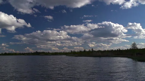 The landscape with clouds over lake Stock Footage 54896324