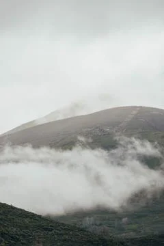 Landscape of clouds over the stone mountain Stock Photos