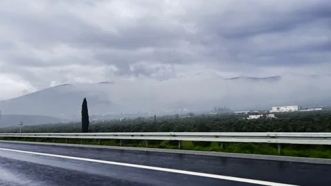 Landscape Cloudy Mountains View on Roat Trip in Car Stock Footage 204737261