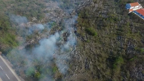 Landscape Covered by Smoke from Forest Fire Stock Footage 121651778