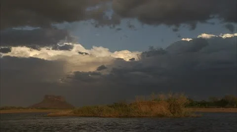 Landscape of dark clouds over water. Niassa Reserve, Mozambique. Stock Footage 23844620
