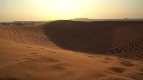 Landscape of desert dunes at sunset on a windy day Video stock 151328532