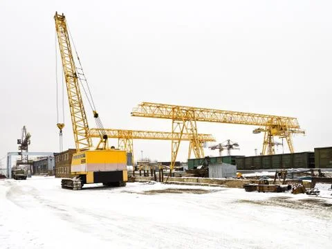 Landscape with different cranes in storage area Stock Photos