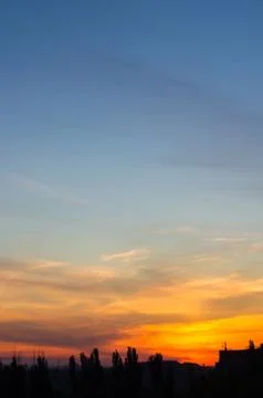 Landscape with dramatic light - beautiful golden sunset with saturated sky an Foto stock