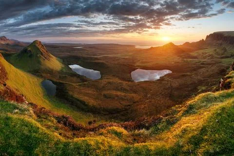 Landscape - Dramatic sunrise sky over the Quiraing hills on the Trotternish p Stock Photos
