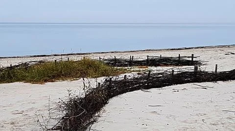 Landscape of the empty beach of the Gulf of Riga in the autumn season Stock Photos