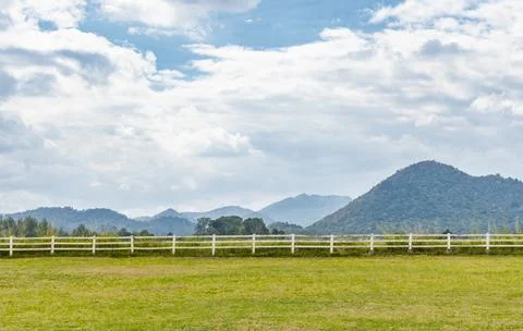 Landscape empty farm with background of mountain scape and cloudy sky. Wide a 스톡 사진