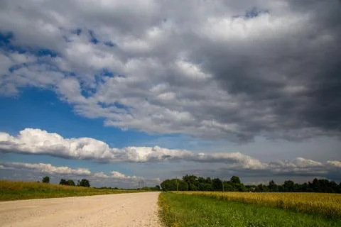 Landscape with empty rural road. Stock Photos