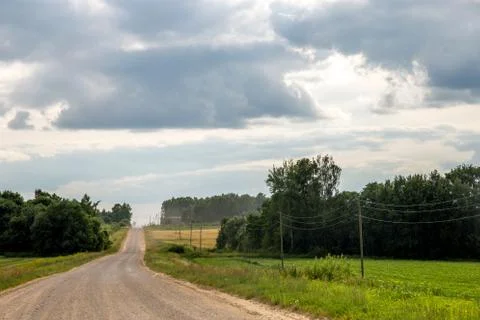 Landscape with empty rural road. Stock Photos
