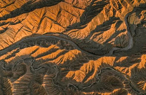 Landscape of eroded hills, top-down, badlands at sunset, aerial view, Canyon of 스톡 사진