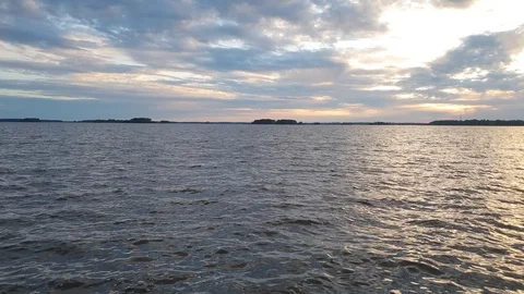 Landscape evening sunset on the river. Evening sky on the lake. Stock Footage 111255000