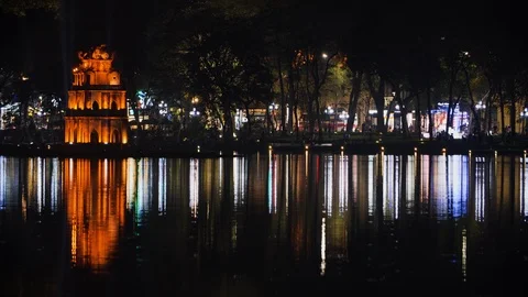 Landscape of famous turtle tower with water reflections from hoan kiem lake Stock-Footage 147366798