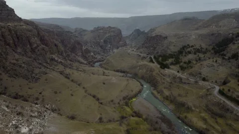 Landscape with a fast mountain river flowing between rocky stones Stock Footage 177523234