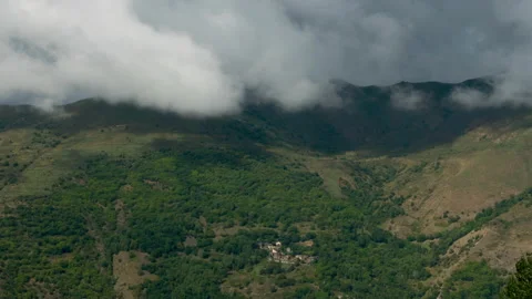 Landscape with fast movement of clouds, sunlight and shadows.Time Lapse.Zoom in Stock Footage 170324453