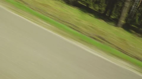 Landscape from a fast moving car. Car window to the side of the road Stock Footage 154401976