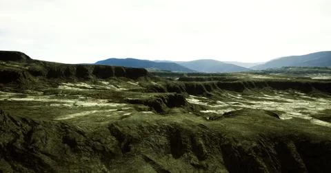 Landscape features rugged terrain under a bright sky in a remote area Stock Illustration