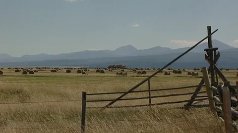 Landscape with Fence and Hay Bales in Big Hole Valley in Western Montana Stock Footage