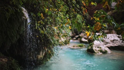 Landscape with flowing water of cascade waterfall at deep tropical rain forest. Stock Footage 101244472