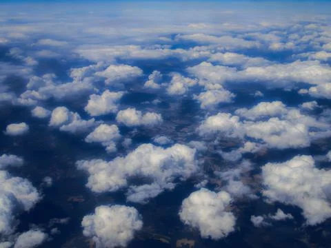 Landscape of fluffy clouds Stock Photos