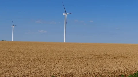Landscape footage of wind generators in the wheat field. Stock Footage 72197763