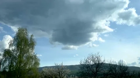 Landscape of forest and mountains outside the window of a passing car Stock Footage 191026353