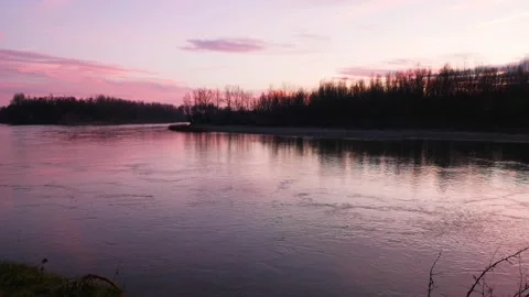 Landscape of a full-flowing mountain river at sunset Stock Footage 228834880