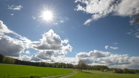 Landscape with grass and clouds in the afternoon time lapse. Stock Footage 162918367
