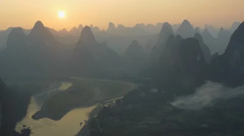 Landscape of Guilin at sunset, Li River and Karst mountains Stock Footage 64830175