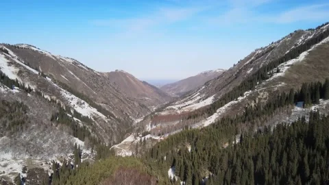 Landscape from the height of  a quadcopter in the mountains in winter. Stock Footage 148489556