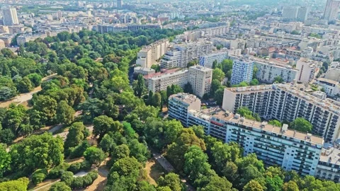 Landscape high angle static drone shot over the Parc des buttes chaumont in 動画素材 341075079