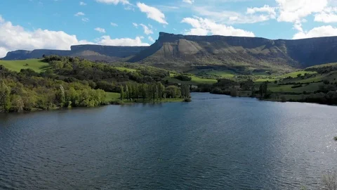 Landscape of lake, green fields and mountain. Stock Footage 106955670