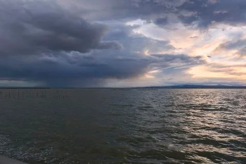 Landscape of a lake with storm clouds Stock Photos